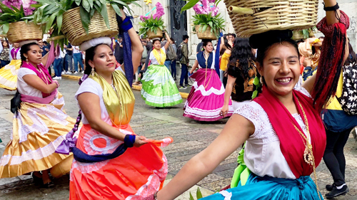 Dancing parade at the Guelaguetza, Oaxaca de Juarez, Mexico. Photo by Mario Valero ""