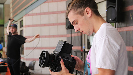 FIT student filming on campus