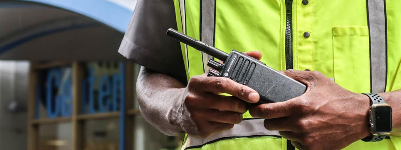 security guard with walkie talkie