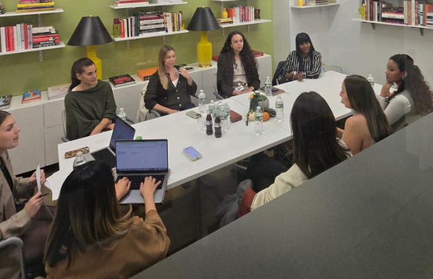 attendees sitting around a conference table