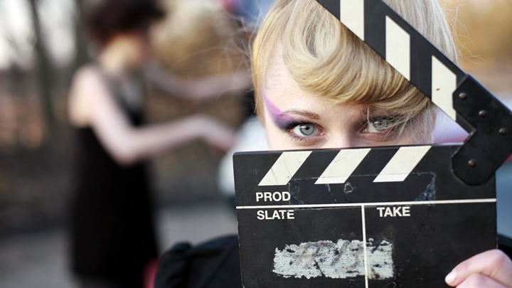 woman with clap board