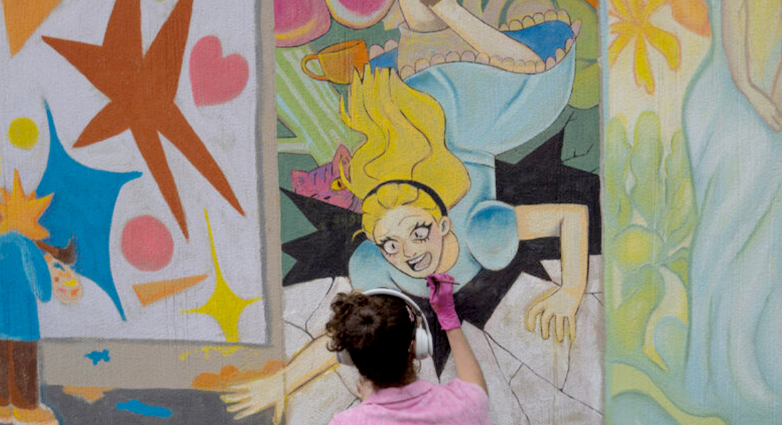 students working on a ChalkFIT murat on campus walls