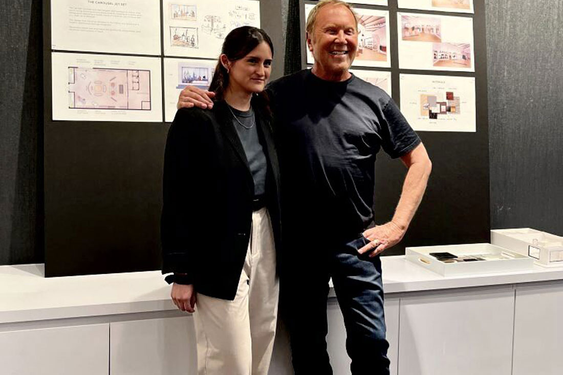 Valentina Rojas, Interior Design ’24, standing with Michael Kors