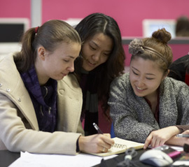 Students filling out a worksheet