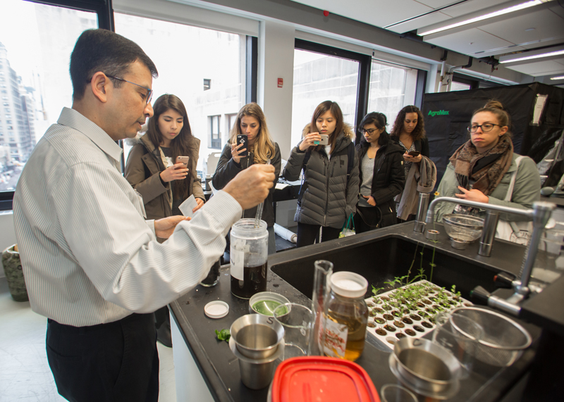 ajoy sarkar demonstrating in the lab