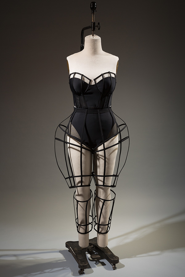 black ensemble with plastic boning