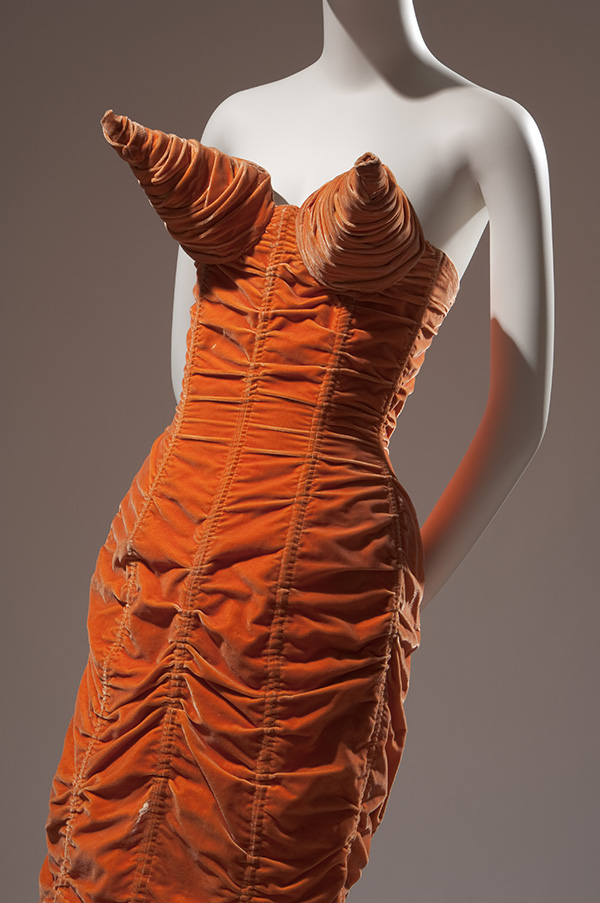 orange strapless dress with 3D cone bras attached to bust