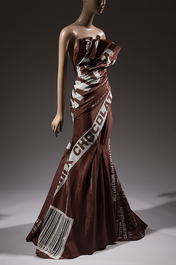 sleeveless floor length evening gown with print white diagonal bar with text, "milk chocoloate" and a barcode