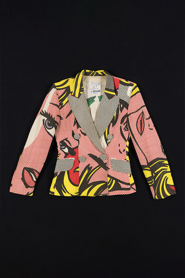 Double breasted blazer with Roy Lichtenstein print of a woman, composed of red, black, and yellow dots