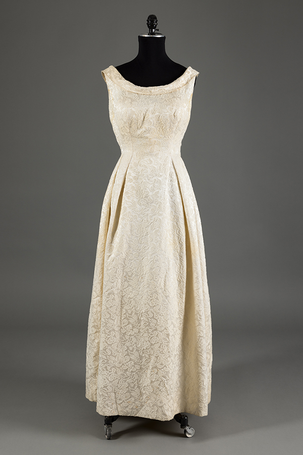 Off-white floral brocade, sleeveless, floor length dress with round neckline