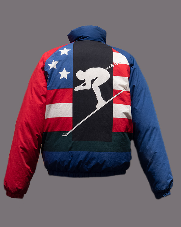 Back view of a red, white and blue puffer jacket with silhouette of downhill skier