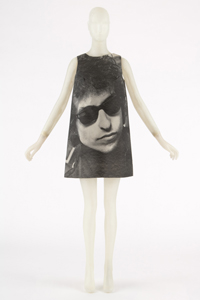 black and white image of Bob Dylan wearing glasses printed on paper dress